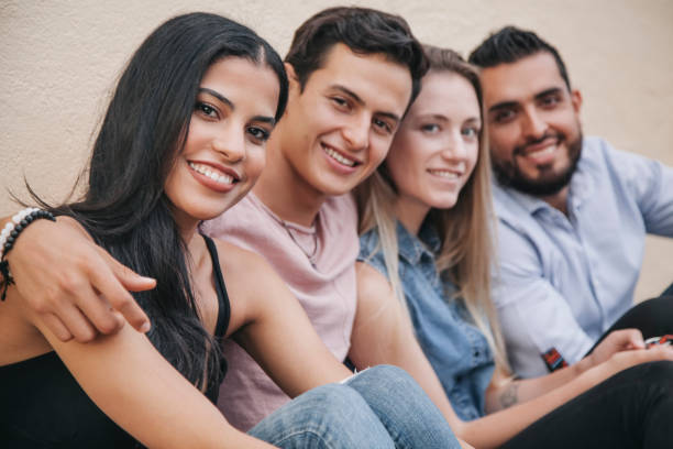 istock Diverse group of young cute friends smiling at camera 1155302137