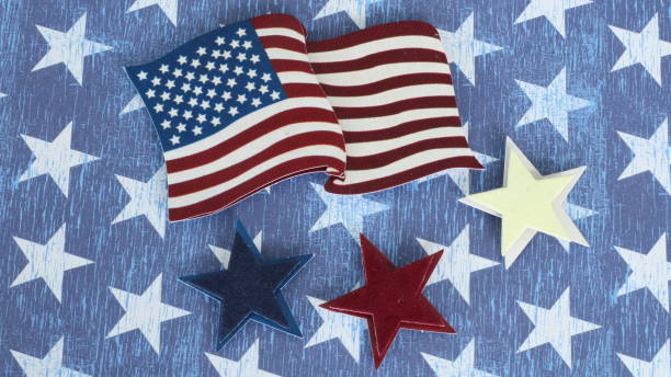 istock American flag above red white and blue stars 1155313577