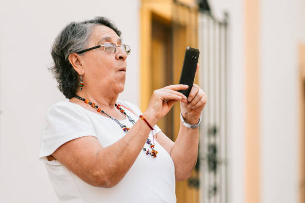 istock Senior woman using smart phone 1155315936