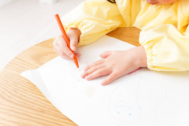 istock Pretty girl and her mother drawing 1155319373