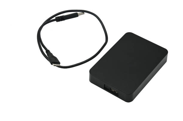 istock External hard drive for storing and transferring various files on a white background 1155320166