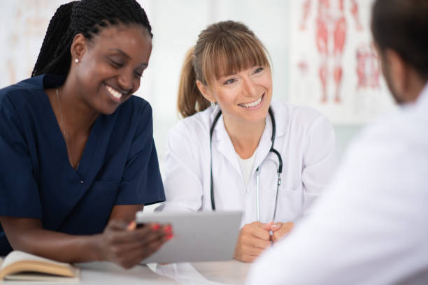 istock Happy medical research team 1155320329