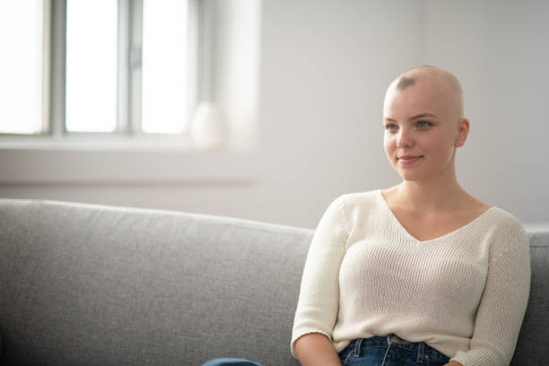 istock Smiling Woman On The Couch 1155320348