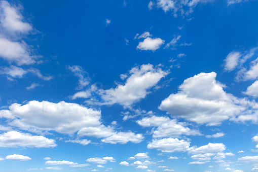 fluffy clouds on blue sky