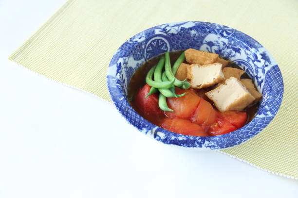 istock nibitashi of tomato and atuage 1155322270