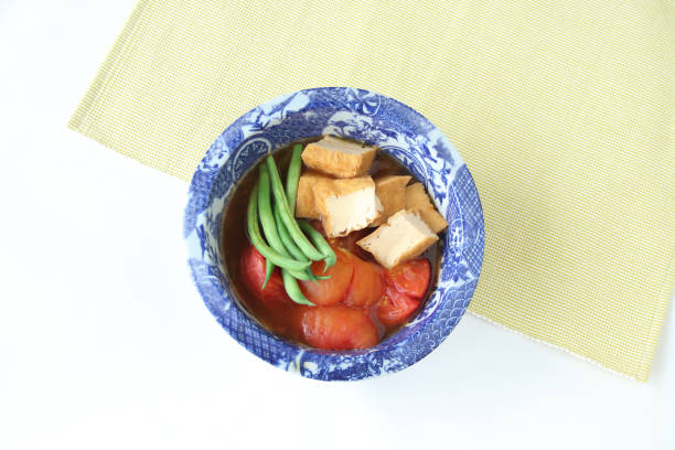 istock nibitashi of tomato and atuage 1155322290