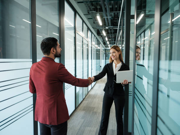 istock Business colleagues shaking hands 1155328015