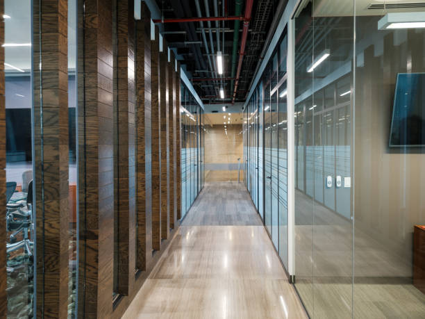 istock Long well light corridor of a business building 1155329198