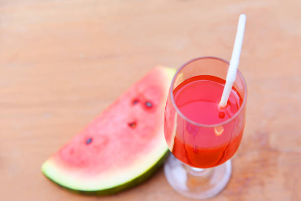 istock Watermelon juice on glass with piece watermelon fruit summer 1155334451
