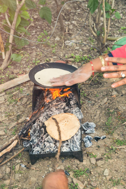 istock Chapati, Indian bread on wood fire, India 1155342588
