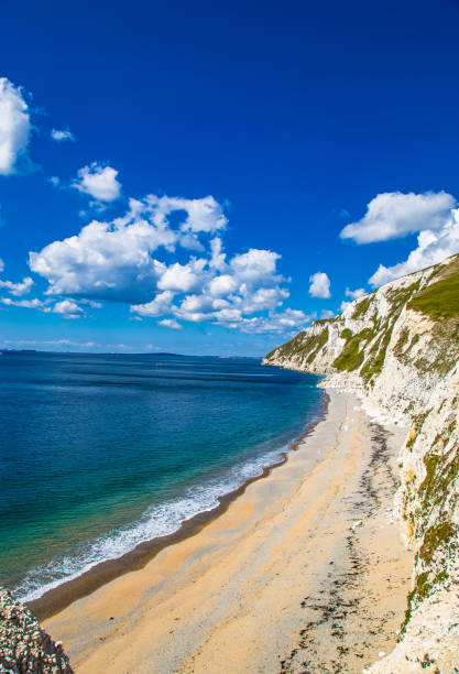 istock Spectacular White Cliffs of Jurassic coastline Dorset England 1155353122