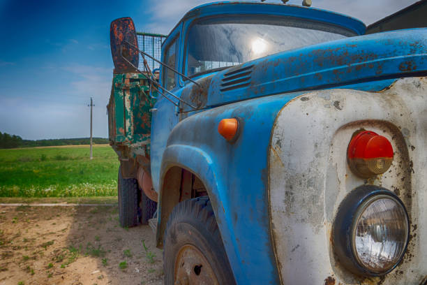 istock Old rusting truck or lorry outdoors in a field 1155355275
