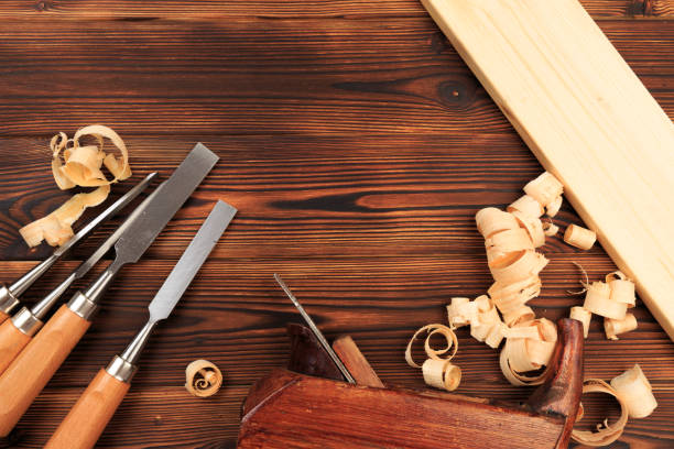 istock chisels plane and sawdust on a wooden table - Image 1155356436