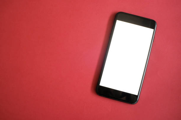 istock Mockup of smart phone on office desk. 1155358588