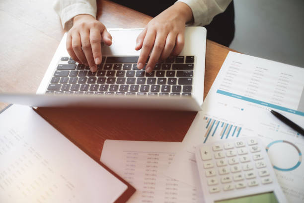 istock Business people working fundamental analyzing about investment in office. 1155361985