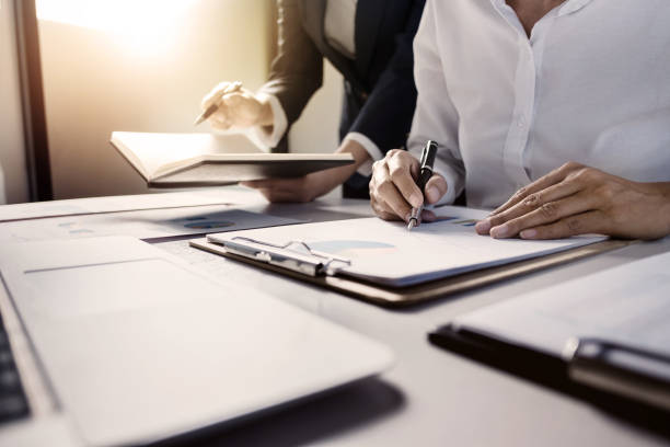 istock Business Administrator meeting with financial data in office room. 1155362002