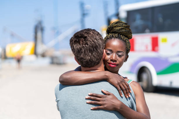 istock Man welcomes his girlfriend on pier 1155362029