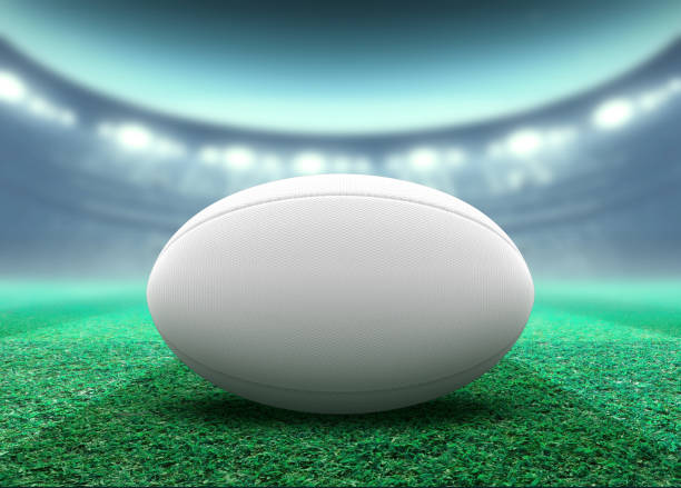 istock Floodlit Stadium And Rugby Ball 1155362142