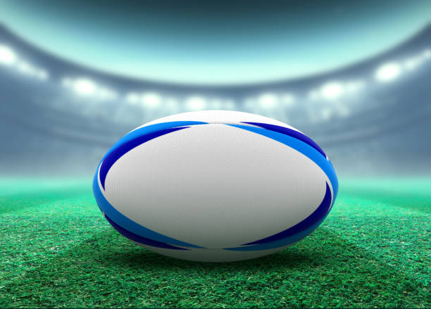 istock Floodlit Stadium And Rugby Ball 1155362297