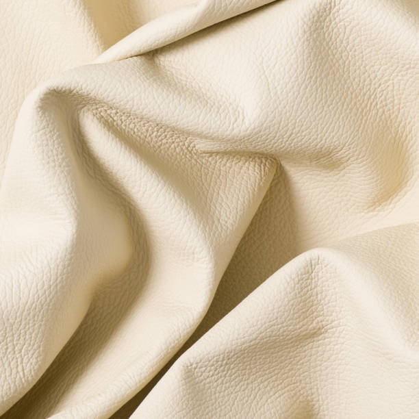 istock Closeup of light color leather material texture background 1155362314