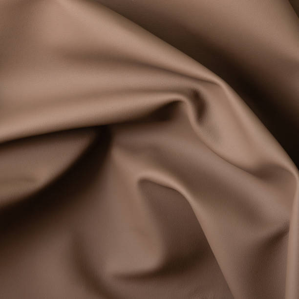 istock Closeup of light color leather material texture background 1155362493