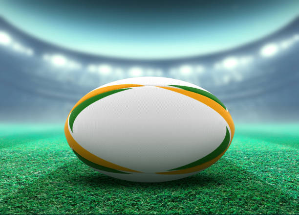 istock Floodlit Stadium And Rugby Ball 1155362517