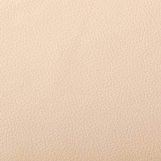 istock Closeup of light color leather material texture background 1155362792