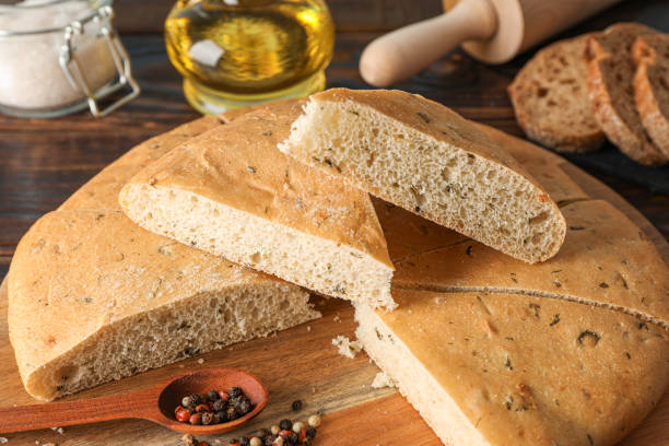 istock Composition with flatbread and kitchen accessories on wooden background, closeup and space for tex 1155362835
