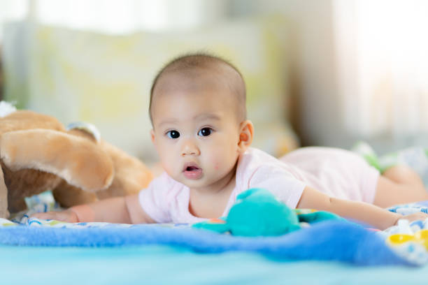 istock Adorable baby on bedroom on morning. 1155363657
