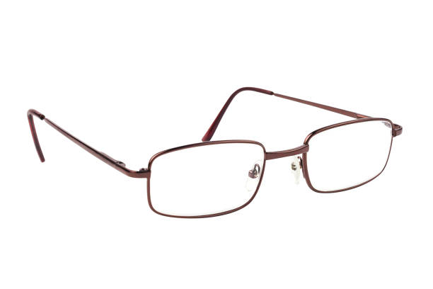 istock One transparent optical glasses in brown metal frame isolated on white background 1155370855