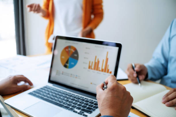 istock Business Administrator meeting with financial data in office room. 1155372326