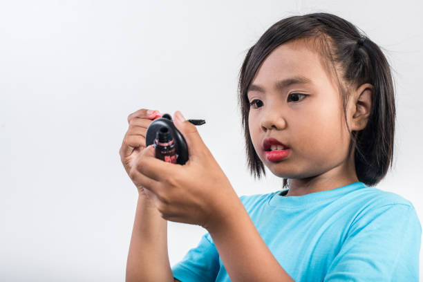 istock Portrait little girl makeup with her face 1155372659