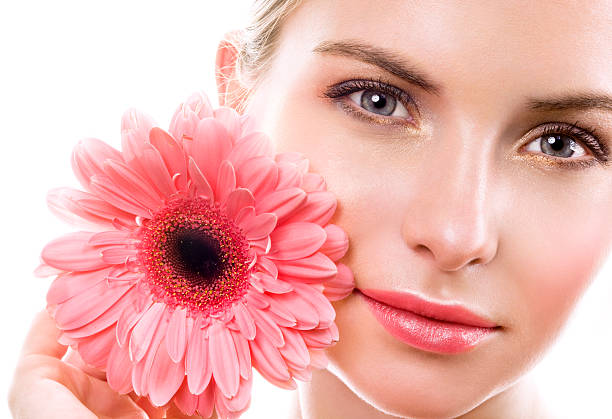 istock Woman with pink flower 115537743