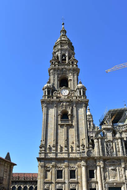 Santiago de Compostela, A Coruña Province, Galicia, Spain. Cathedral, view of baroque clock tower from Plaza de la Quintana.