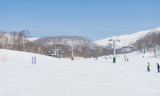 Niseko, Japan - March 4,2019 : People enjoy ski at Niseko Annupuri Kokusai Ski Area at Niseko, Hokkaido,Japan on March 4,2019.