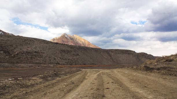 istock Grunge dirt road. Beautiful landscape. Spring 1155381534