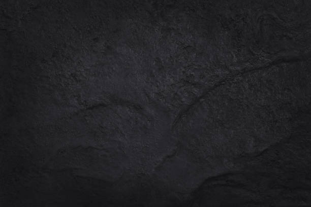 istock Dark grey black slate texture in natural pattern with high resolution for background and design art work. Black stone wall. 1155381745
