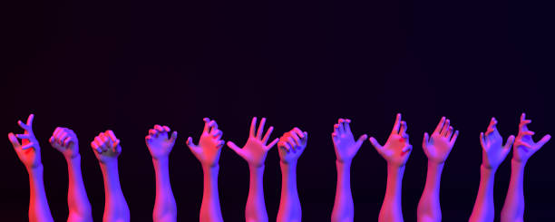 istock lot of hands in neon light on a dark background 1155390898