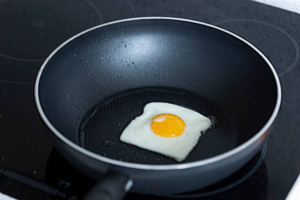 istock An egg frying shaped like a slice of bread 1155391111