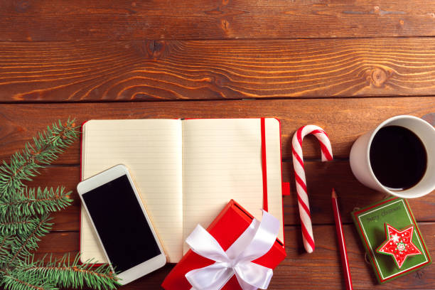 istock Greeting card and gift box on office table 1155393651