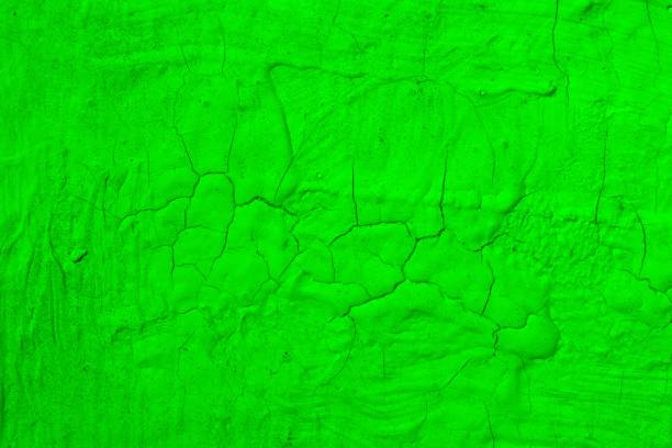 istock green creative rough broken paint texture - wonderful abstract photo background 1155393657