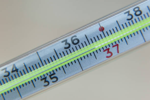 istock Healthy temperature shown by mercury thermometer 1155393836