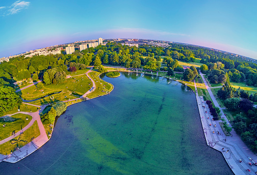 A beautiful panoramic view of the sunset in a fabulous evening in June from drone at Pola Mokotowskie in Warsaw, Poland - \