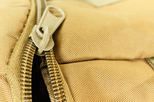 zipper bag color khaki texture.