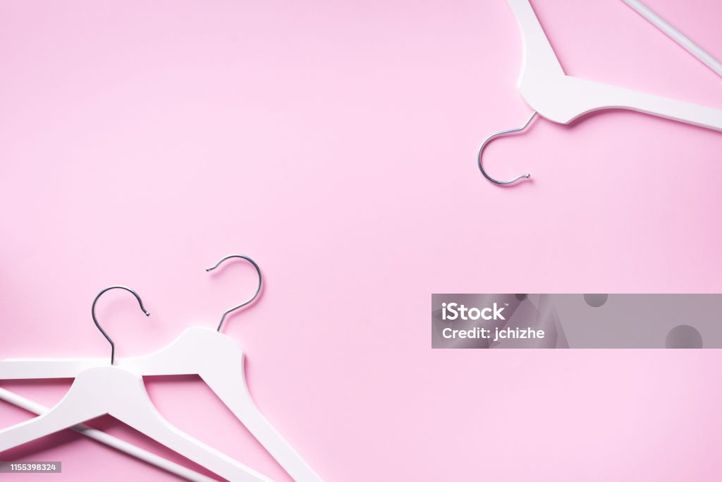 White Clothes Hangers On Pink Background With Copy Space Flat Lay Top View  Minimalism Style Creative Layout Fashion Store Sale Shopping Concept Banner  For Feminine Blog Stock Photo - Download Image Now -