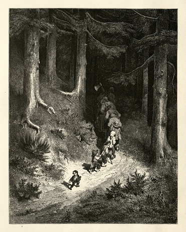 Vintage engraving of And here and there along the track dropping a pebble to guide him back. Hop O’ My Thumb, Fairy Tales of Charles Perrault illustrated by Gustave Dore