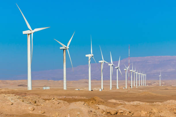 Wind turbine farm - renewable, sustainable and alternative energy Wind power is one of the fastest-growing renewable energy technologies. Usage is on the rise worldwide, in part because costs are falling. Many parts of the world have strong wind speeds, but the best locations for generating wind power are sometimes remote ones. Windmills for electric power production in the desert in Egypt. north africa stock pictures, royalty-free photos & images