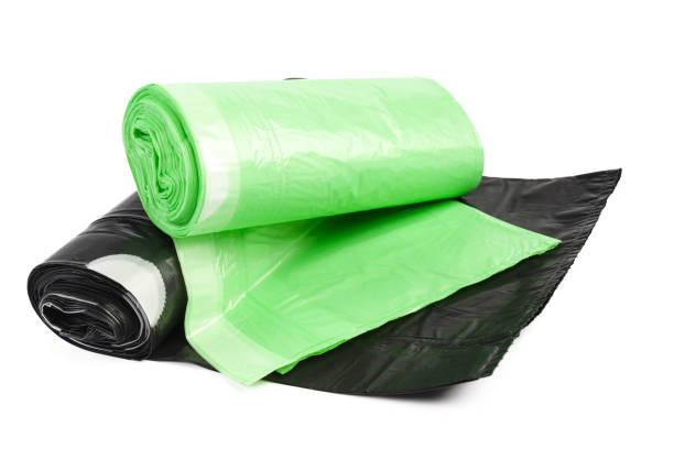 istock roll of plastic garbage bags isolated on white background 1155416949