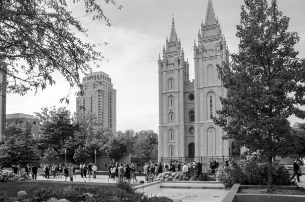 188th Semiannual General Conference of the Church in Salt Lake City, Utah Salt Lake City, Utah, USA - October 6, 2018: Individuals and families from all over the world gather in Temple Square in the heart of Salt lake City, Utah for the 188th Semiannual General Conference of the Church of Latter Day Saint. The Conference is held biannually every April and October at the Conference Center in Salt Lake City, Utah. During each conference, members of the church gather in a series of two-hour sessions to listen to sermons from church leaders. Originating from Salt Lake City, General Conference is considered an international event for the church. The sessions are broadcast worldwide in over 90 languages and over the Internet. mormon woman photos stock pictures, royalty-free photos & images