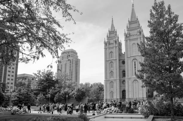 188th Semiannual General Conference of the Church in Salt Lake City, Utah Salt Lake City, Utah, USA - October 6, 2018: Individuals and families from all over the world gather in Temple Square in the heart of Salt lake City, Utah for the 188th Semiannual General Conference of the Church of Latter Day Saint. The Conference is held biannually every April and October at the Conference Center in Salt Lake City, Utah. During each conference, members of the church gather in a series of two-hour sessions to listen to sermons from church leaders. Originating from Salt Lake City, General Conference is considered an international event for the church. The sessions are broadcast worldwide in over 90 languages and over the Internet. mormon woman photos stock pictures, royalty-free photos & images